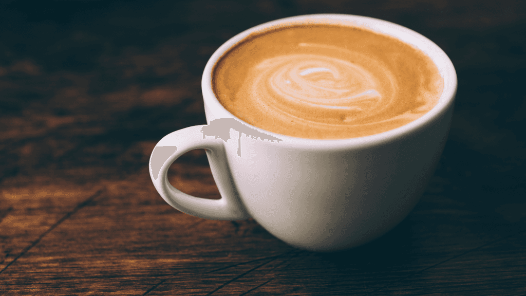 Un café avec une mousse de lait du meilleur lait végétal pour café
